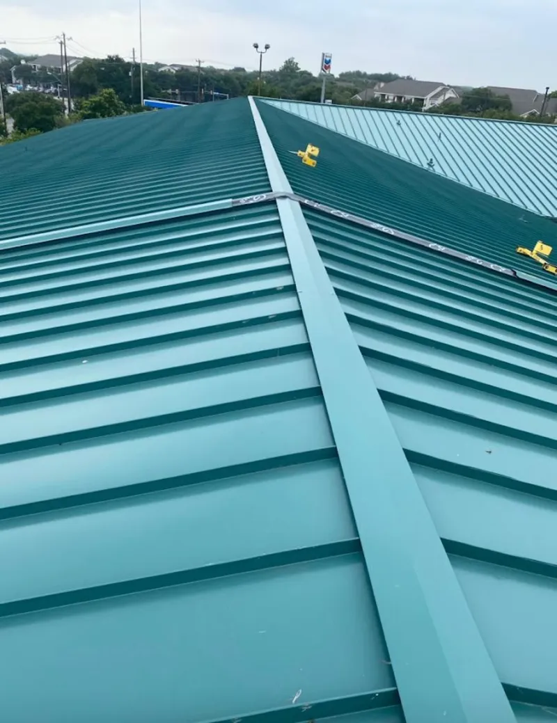Green commercial metal roof ridge and valley for Metal Roof Repair in Grand Terrace